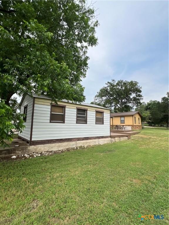 6769 Cedar Cove Rd, Belton, TX 76513 - back of property with a yard