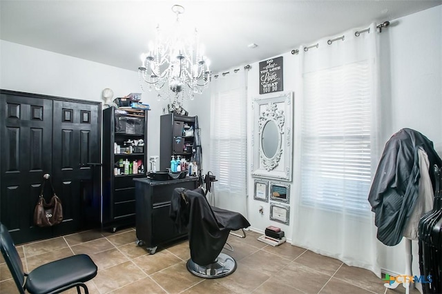 interior space with light tile patterned floors and a notable chandelier