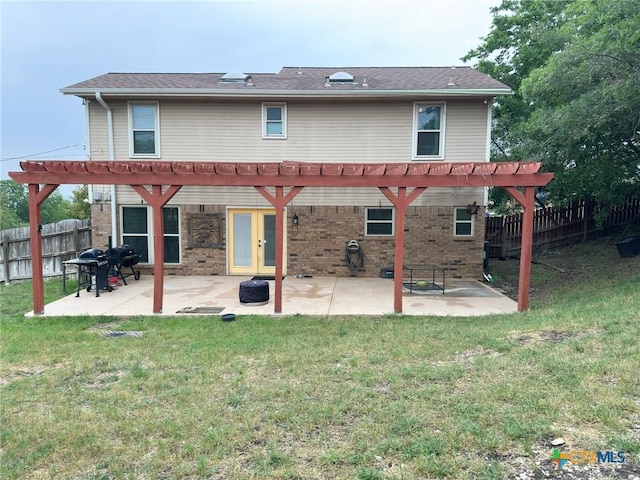 1106 Bowen Ave, Copperas Cove, TX 76522 - back of house with a pergola, french doors, a patio, and brick siding