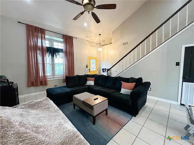 1106 Bowen Ave, Copperas Cove, TX 76522 - living room featuring light tile patterned floors, a ceiling fan, stairway, baseboards, and recessed lighting