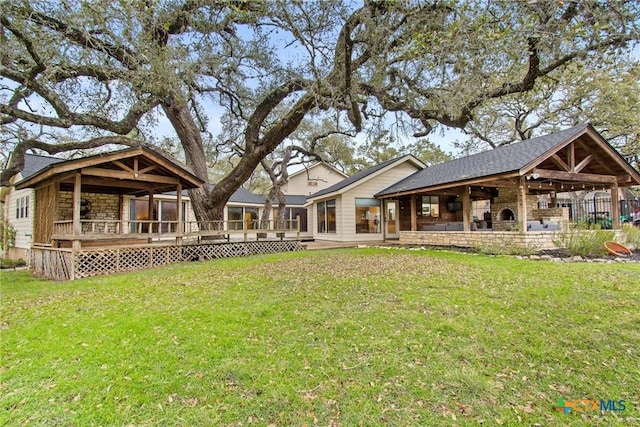 view of yard with a wooden deck