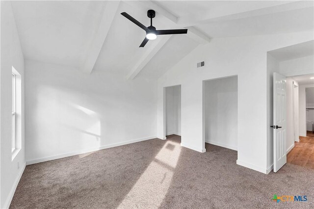 414 Ellis St, Seguin, TX 78155 - carpeted empty room featuring lofted ceiling with beams, baseboards, ceiling fan, and visible vents