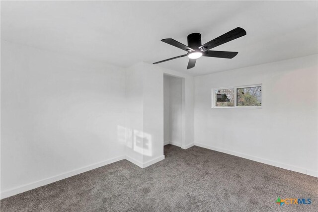 414 Ellis St, Seguin, TX 78155 - carpeted empty room featuring baseboards and a ceiling fan