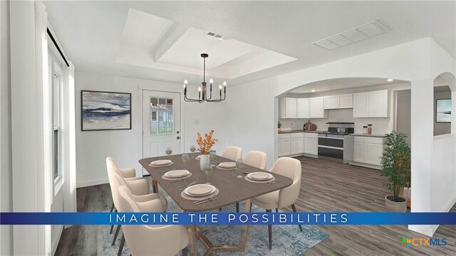414 Ellis St, Seguin, TX 78155 - dining space featuring a raised ceiling, arched walkways, dark wood-type flooring, and visible vents