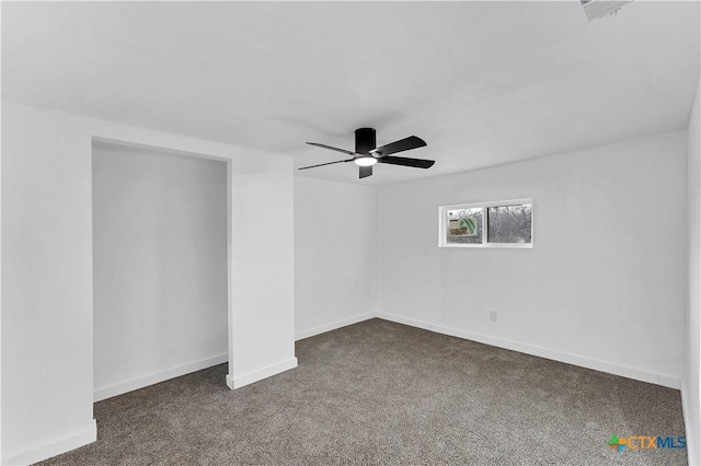 414 Ellis St, Seguin, TX 78155 - carpeted empty room with baseboards, visible vents, and a ceiling fan