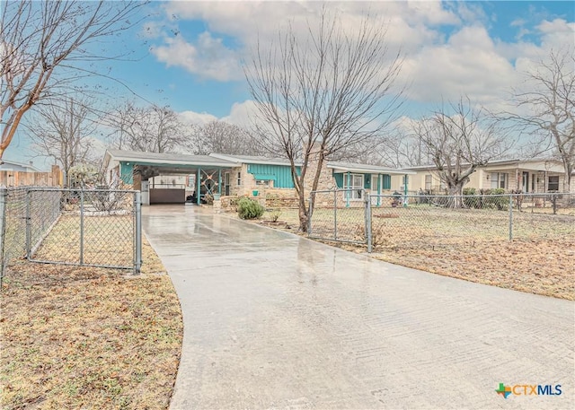 ranch-style house with a carport