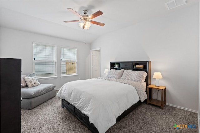 bedroom featuring ceiling fan, vaulted ceiling, and carpet