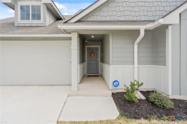 property entrance featuring a garage