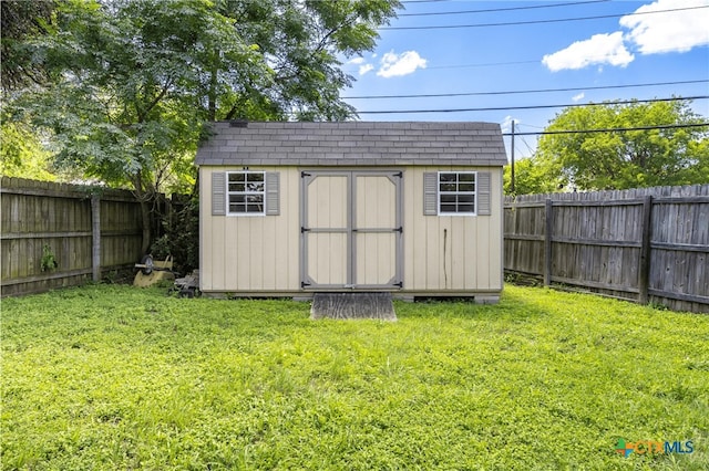 504 Surghnor St, Belton, TX 76513 - view of shed featuring a fenced backyard