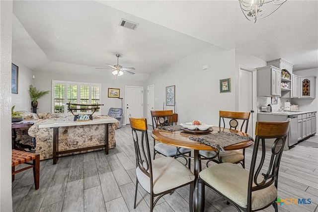 504 Surghnor St, Belton, TX 76513 - dining room featuring wood finish floors, ceiling fan, and a textured ceiling