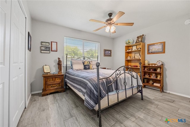 504 Surghnor St, Belton, TX 76513 - bedroom with light wood-style floors, a ceiling fan, and a closet