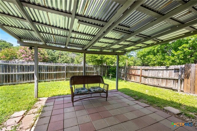 504 Surghnor St, Belton, TX 76513 - fenced backyard featuring a patio