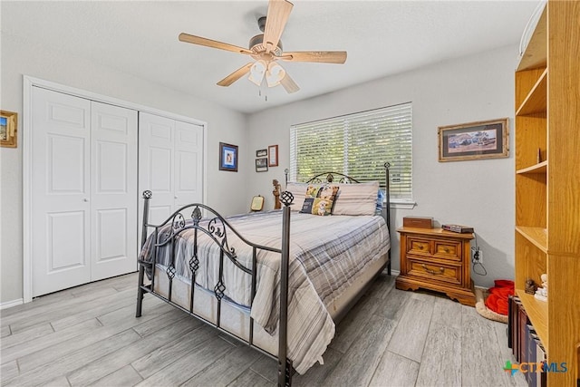 504 Surghnor St, Belton, TX 76513 - bedroom featuring light wood-style flooring, a closet, and a ceiling fan