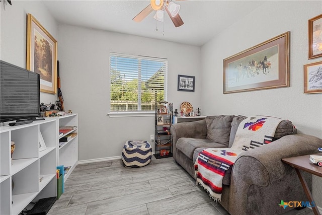 504 Surghnor St, Belton, TX 76513 - living room featuring a ceiling fan and light wood-style flooring