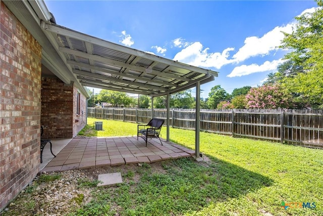 504 Surghnor St, Belton, TX 76513 - fenced backyard with a patio area