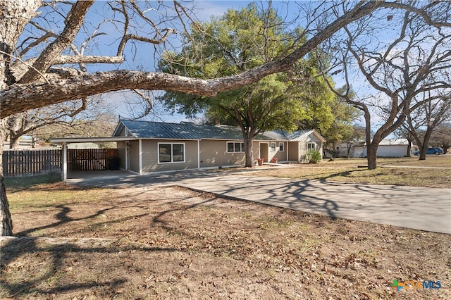 rear view of house with a carport