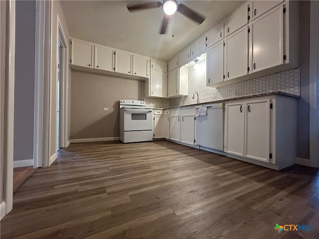 kitchen with white cabinetry, dark wood-type flooring, and white appliances