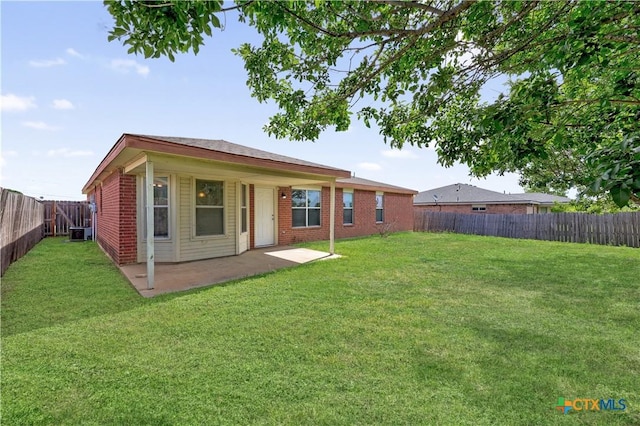 4104 Matt Ct, Killeen, TX 76549 - rear view of property with a patio area, central AC unit, and brick siding
