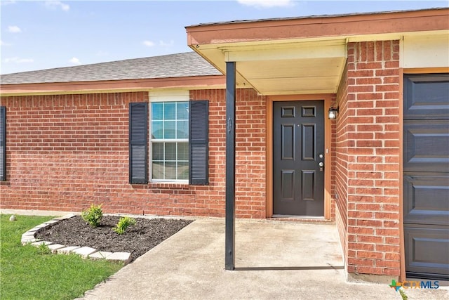 4104 Matt Ct, Killeen, TX 76549 - property entrance featuring brick siding and roof with shingles