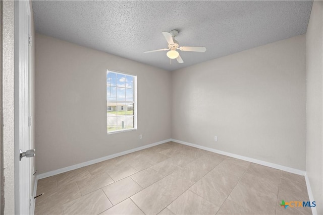 4104 Matt Ct, Killeen, TX 76549 - unfurnished room featuring a ceiling fan, light tile patterned floors, a textured ceiling, and baseboards