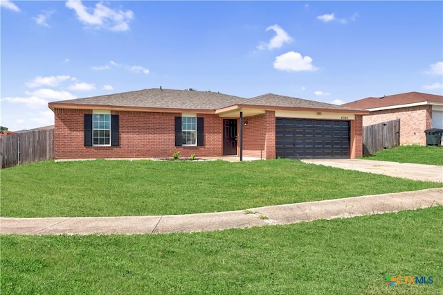 4104 Matt Ct, Killeen, TX 76549 - ranch-style home with a garage, driveway, and brick siding