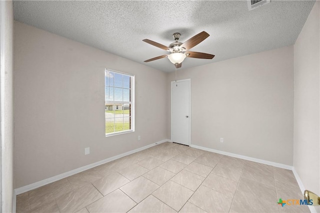 4104 Matt Ct, Killeen, TX 76549 - unfurnished room featuring ceiling fan, a textured ceiling, light tile patterned flooring, and baseboards