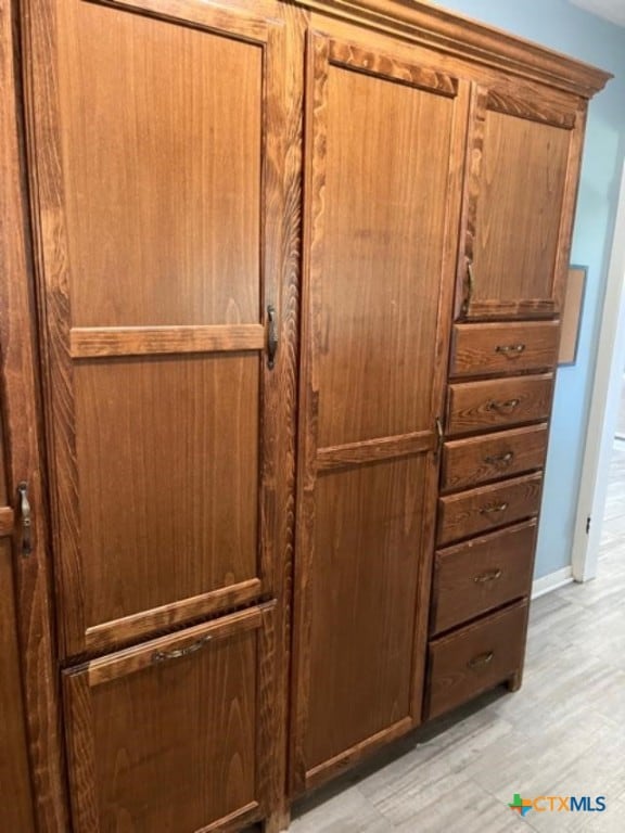 details with wood finished floors