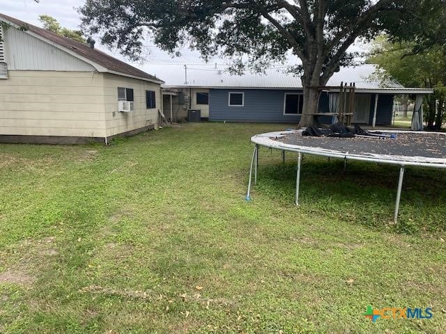 view of yard with a trampoline
