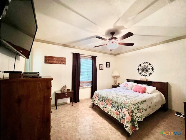 bedroom featuring ornamental molding and a ceiling fan