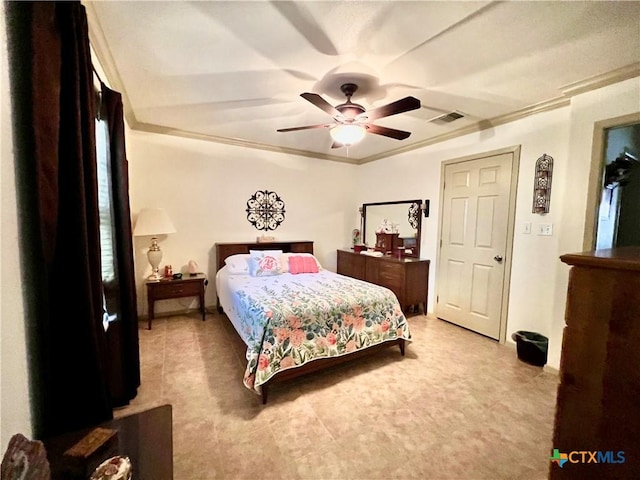 bedroom featuring crown molding and a ceiling fan