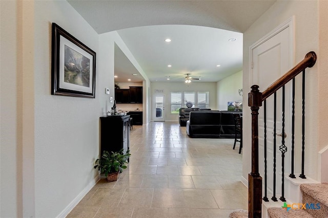 hallway featuring light tile patterned floors