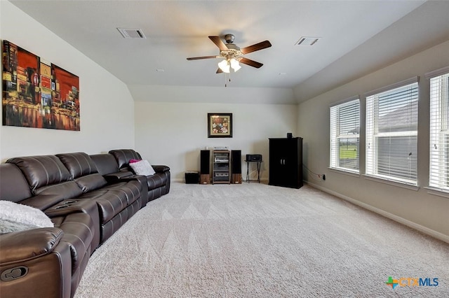 living room with carpet and ceiling fan