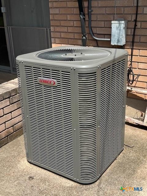 2410 Robin Rd, Temple, TX 76502 - exterior view of a central AC unit and brick siding