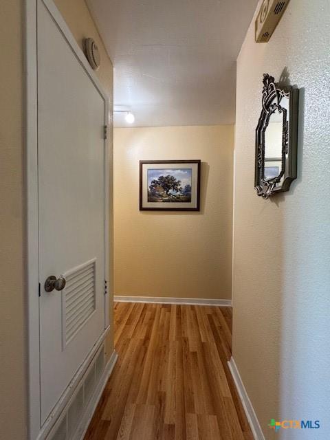 2410 Robin Rd, Temple, TX 76502 - corridor featuring light wood finished floors and baseboards