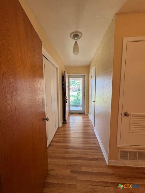 2410 Robin Rd, Temple, TX 76502 - corridor with wood finished floors and baseboards