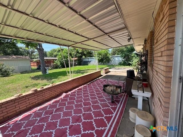 2410 Robin Rd, Temple, TX 76502 - fenced backyard with a patio area