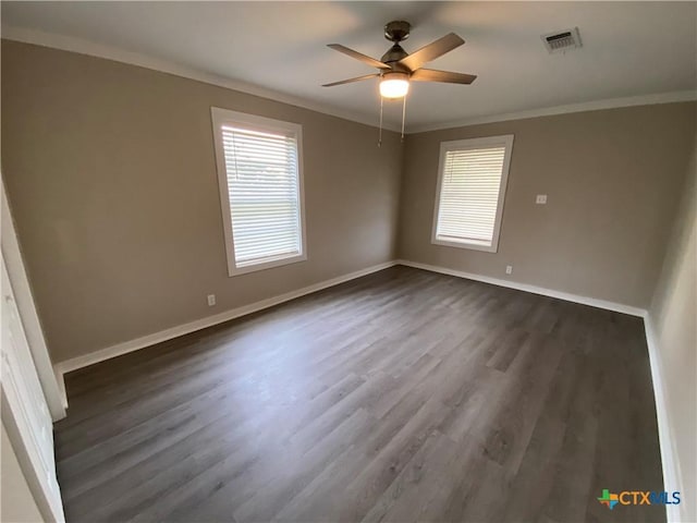 unfurnished bedroom featuring ornamental molding, visible vents, and baseboards