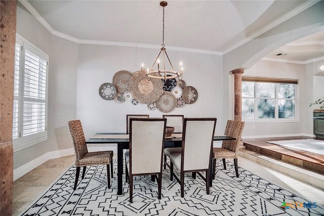 2788 Morning Moon, New Braunfels, TX 78132 - dining area featuring arched walkways, healthy amount of natural light, a chandelier, and ornamental molding