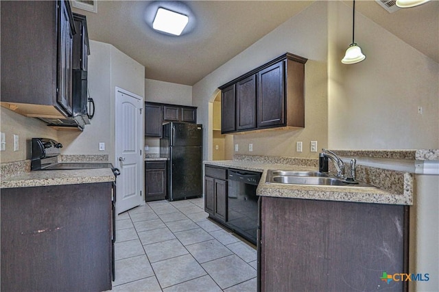 kitchen with dark brown cabinets, sink, black appliances, decorative light fixtures, and light tile patterned flooring