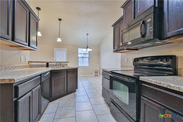 kitchen with pendant lighting, lofted ceiling, black appliances, light tile patterned floors, and a chandelier