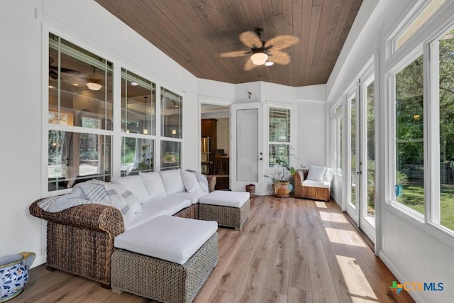 sunroom / solarium with french doors, wood ceiling, and wood finished floors