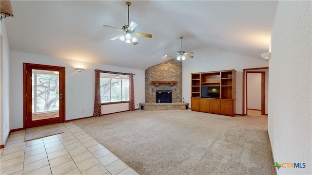 unfurnished living room with lofted ceiling, a brick fireplace, light colored carpet, and ceiling fan