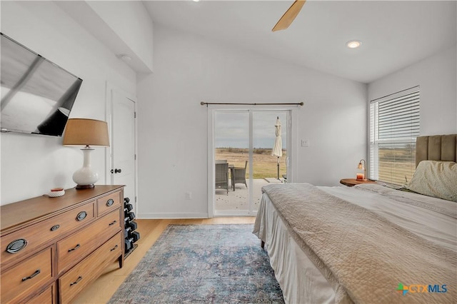 bedroom featuring access to outside, ceiling fan, light wood-type flooring, and multiple windows