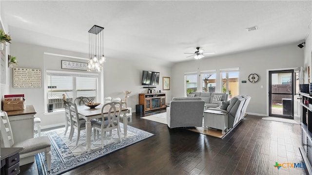 3616 Blue Cloud Dr, New Braunfels, TX 78130 - living room with ceiling fan, dark wood finished floors, baseboards, and a chandelier