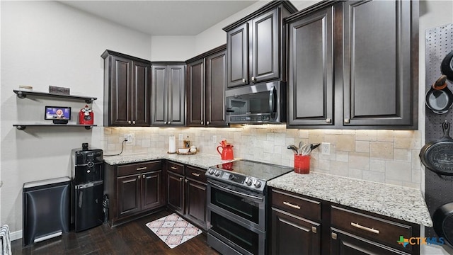 3616 Blue Cloud Dr, New Braunfels, TX 78130 - kitchen with stainless steel appliances, dark wood finished floors, tasteful backsplash, and light stone countertops