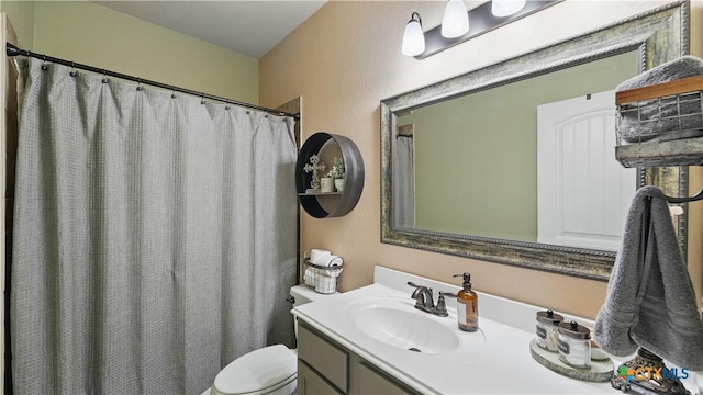 3616 Blue Cloud Dr, New Braunfels, TX 78130 - bathroom with vanity, toilet, and curtained shower