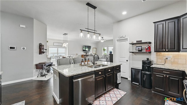 3616 Blue Cloud Dr, New Braunfels, TX 78130 - kitchen with dishwasher, a sink, a kitchen island with sink, tasteful backsplash, and healthy amount of natural light