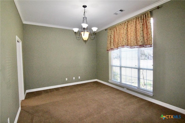 carpeted spare room with ornamental molding and an inviting chandelier