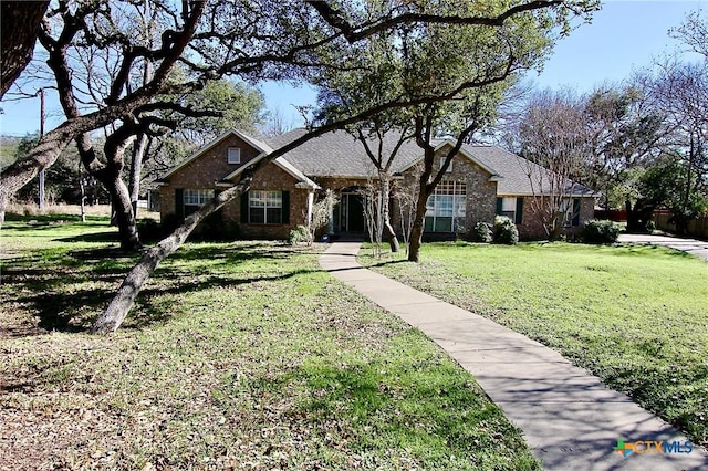 view of front of home with a front lawn