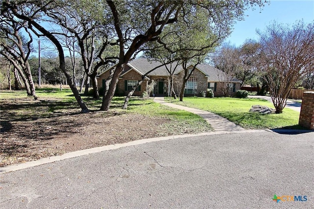 view of front facade with a front yard